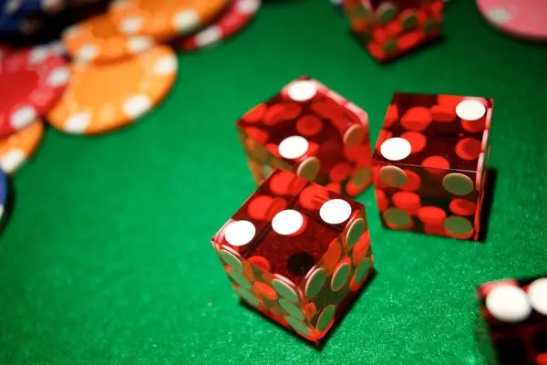 grab4d Caribbean Stud Poker table lobby showing stake levels and available seats